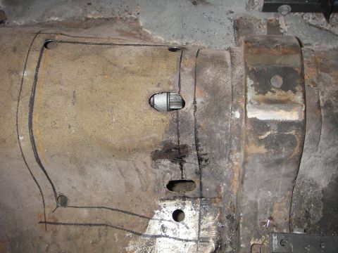 1972 Ford Ranchero - I traced around the outside of the tunnel hump, added the allowance to the inside and drilled the corners with a step bit