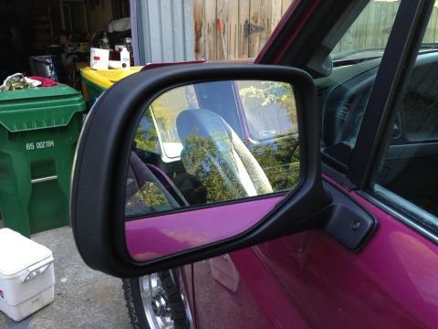 1992 Ford F-150 - Glass cleaned and plastic repainted black.