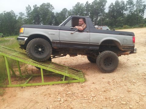 2013 Ford Bronco - Ford Bronco is shown climbing a ramp, demonstrating its off-road capabilities.
