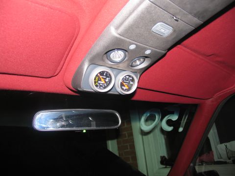 1990 Chevrolet Silverado 1500 - Aftermarket gauges installed in the headliner of a 1990 Chevrolet Silverado 1500.