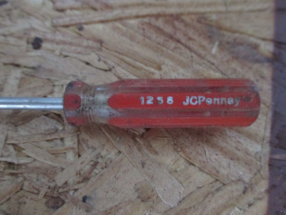 Red JCPenney screwdriver with 1258 marking