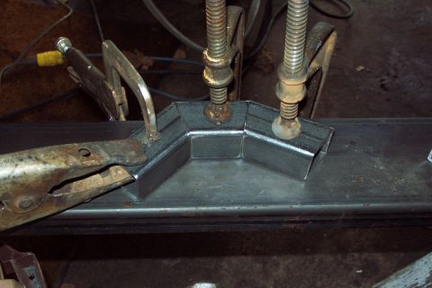 1996 Ford Bronco - Jigging up the step bar multi angle ends for welding. (12/20/2003)