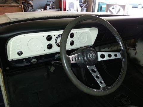 1967 Ford F-100 - Dashboard and steering wheel of a 1967 Ford F-100.