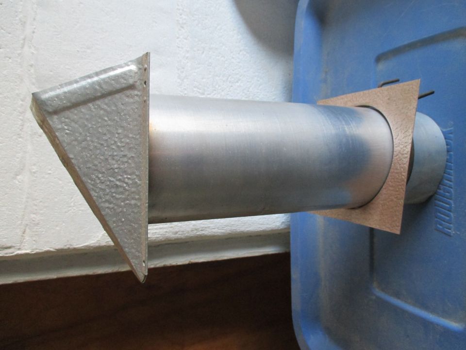 Vent pipe extending from a blue container
