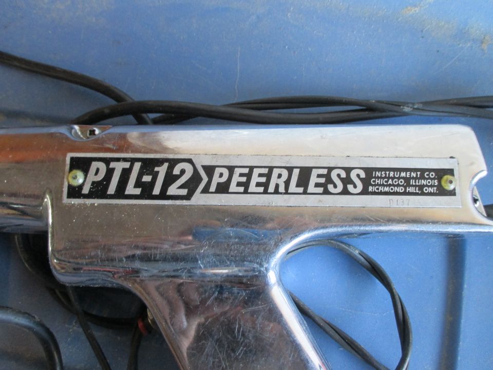 Chrome instrument labeled PTL-12 PEERLESS, made by INSTRUMENT CO. CHICAGO, ILLINOIS RICHMOND HILL, ONT