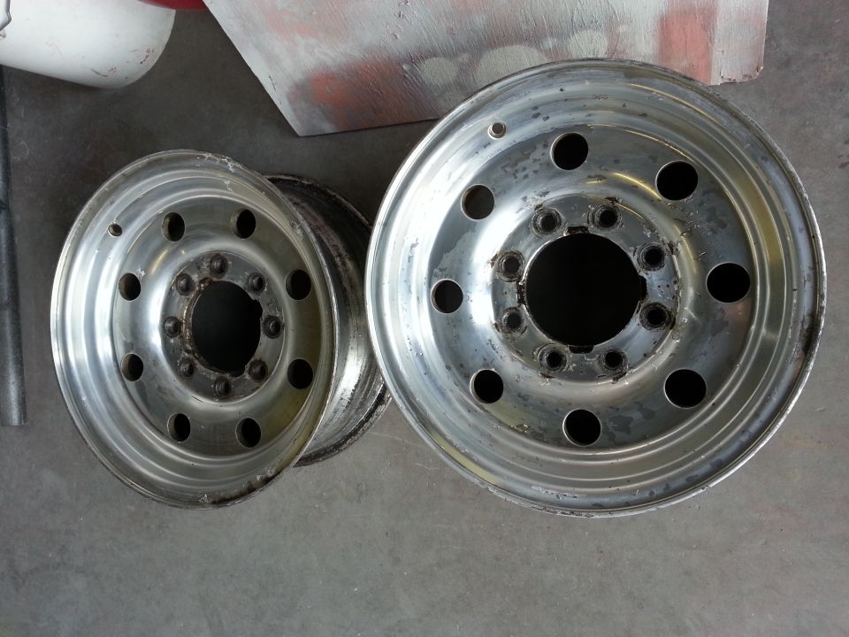 Two aluminum truck wheels with 8 lug holes