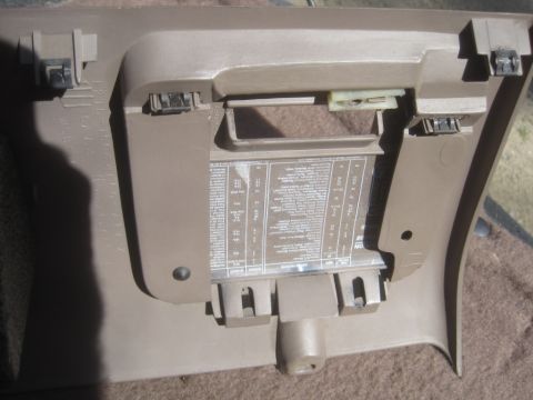 1993 Ford Bronco - Interior panel with fuse box diagram, likely from a Ford Bronco, but year is unconfirmed.