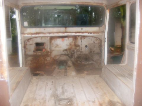 1978 Ford Bronco - The interior of this vehicle appears to be in a state of disrepair, with significant rust visible on the metal surfaces.