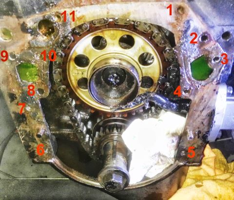1978 Ford Bronco - Close-up view of engine timing chain and gears, showing mechanical components.