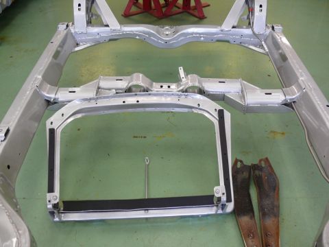 1976 Chevrolet Corvette - The bare chassis of a car is shown, suggesting it is undergoing restoration or repair.