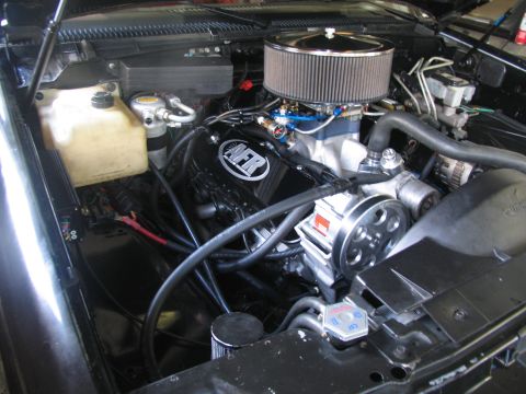1990 Chevrolet Silverado 1500 - Customized engine bay AFR valve covers and a chrome air cleaner assembly.