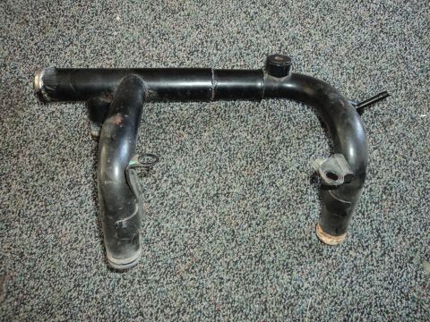 2004 Mercury Grand Marquis - This is a metal coolant pipe, likely from a vehicle's engine bay.