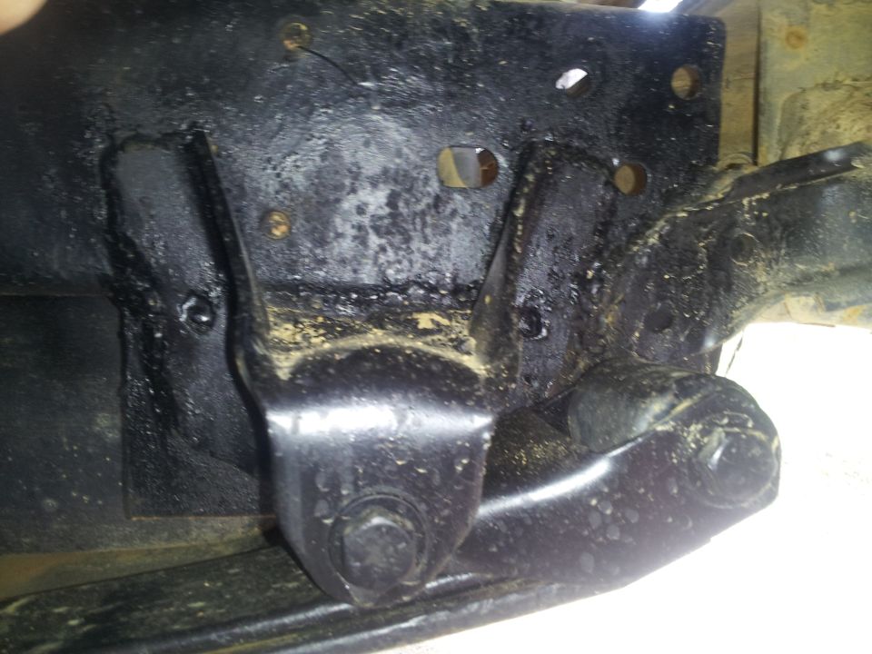 Black frame bracket with bolts, Supermotors.net logo visible