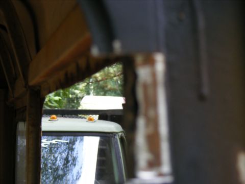 1978 Ford Bronco - Looking out from the interior of a vehicle, with amber marker lights visible on the roof.