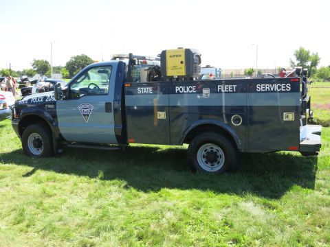 2001 Ford Crown Victoria - Side view of a Massachusetts State Police truck equipped with a generator.
