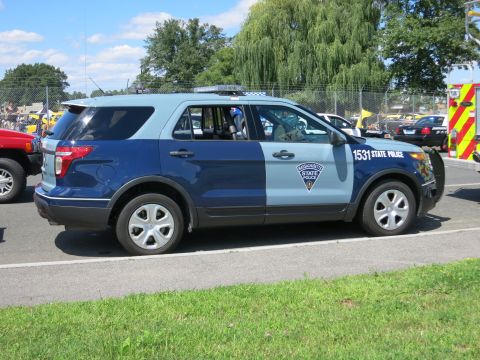 2001 Ford Crown Victoria - Massachusetts State Police SUV with markings '1531 STATE POLICE' on the side.