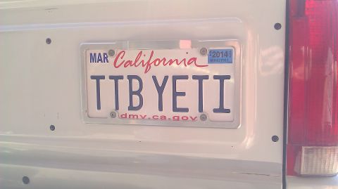 1996 Ford Bronco - A California license plate with the custom text TTB YETI is visible on the rear of a vehicle.