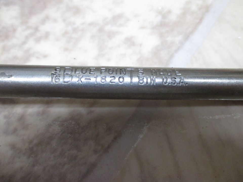 Close-up of a Blue Point tool with markings '16DX-1820' and 'MADE IN U.S.A.'