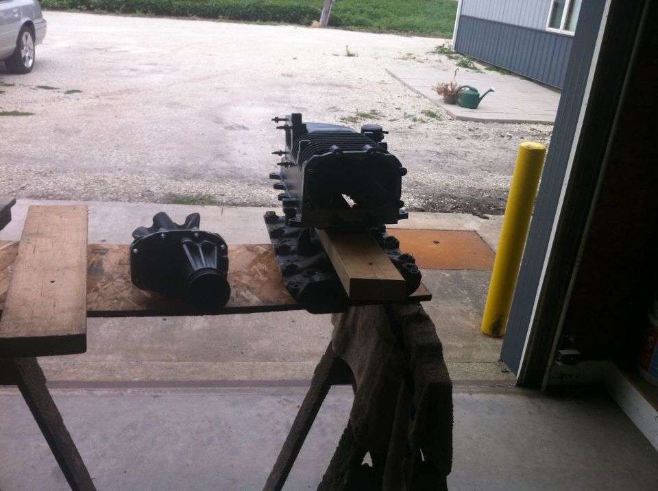 Engine block and transmission on sawhorses