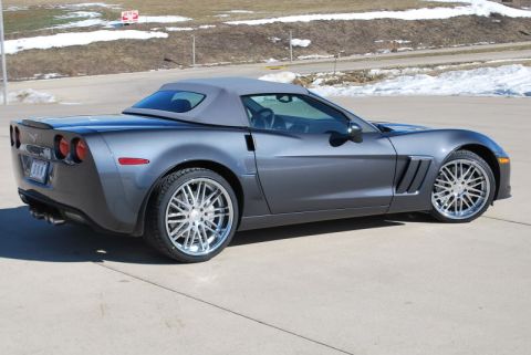 1976 Chevrolet Corvette - This modern sports car features a design and custom chrome wheels.