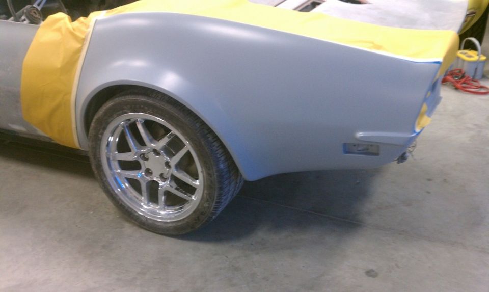 1976 Chevrolet Corvette rear quarter panel and wheel, prepped for paint