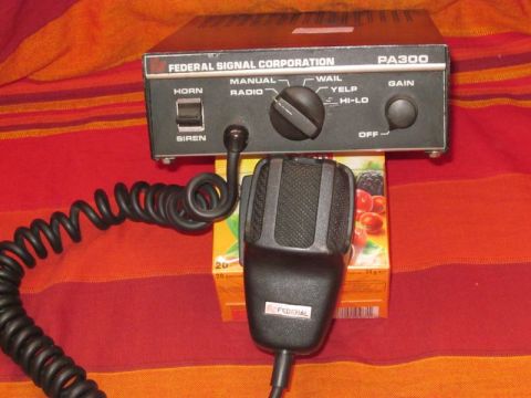 1991 Ford LTD Crown Victoria - Federal Signal PA300 siren/PA unit with microphone and coiled cord.