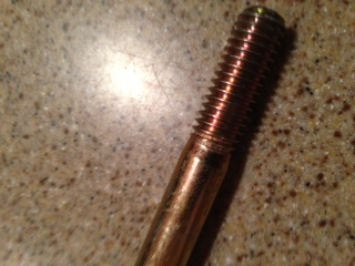 1996 Ford Bronco - A close-up view of a threaded bolt, with the SuperMotors.net logo visible in the lower right corner.