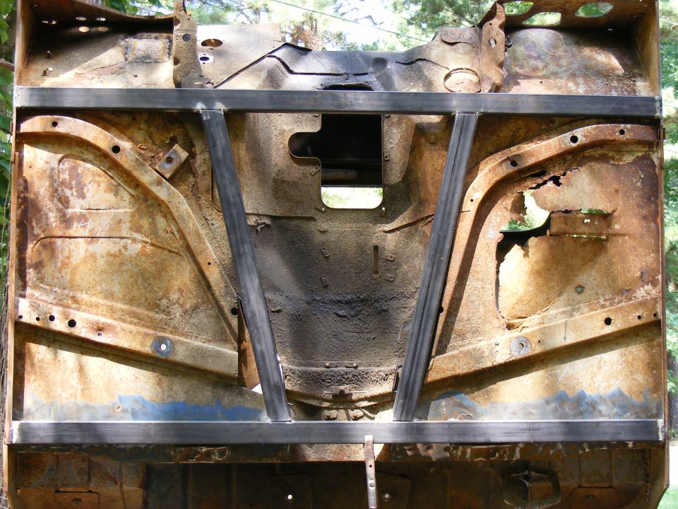 Rusted vehicle firewall with metal bracing