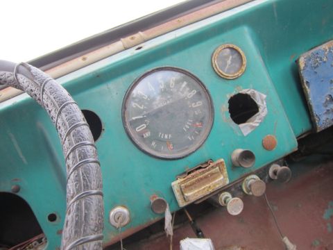 2001 Ford Crown Victoria - The interior dashboard features a central gauge cluster with readings for fuel, oil, amperage, and temperature.