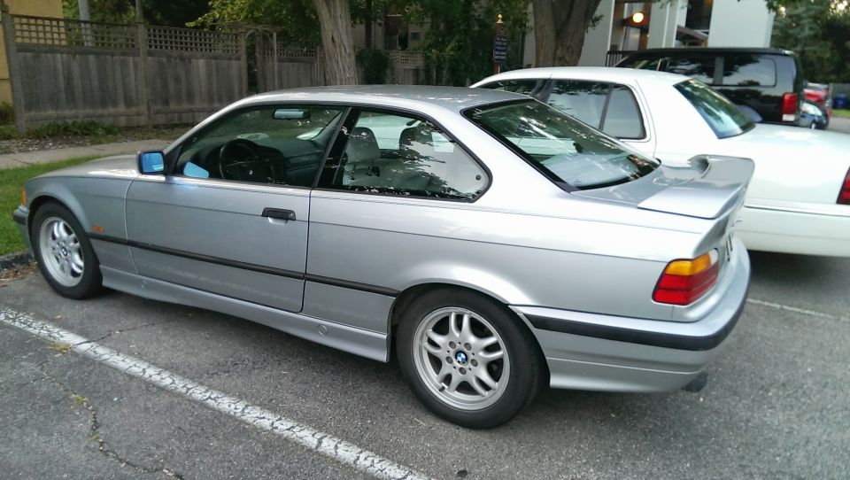 Silver 1997 BMW 3 Series coupe, rear 3/4 view