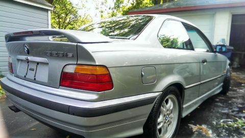 1997 BMW 3 Series - 1997 BMW 323is coupe with a rear spoiler and aftermarket wheels.