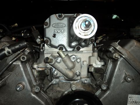 2004 Mercury Grand Marquis - Close-up view of a Ford SVT engine part, possibly from a performance modification.