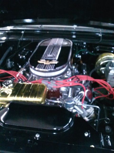 1960 Ford Falcon - A close-up view of a car's engine bay, showing various components and wiring.