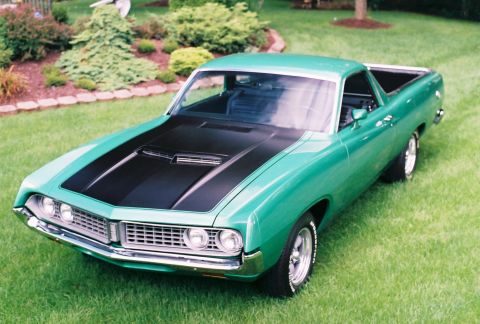 1971 Ford Ranchero - This vehicle has a distinctive grille and dual headlights, characteristic of early 1970s models.