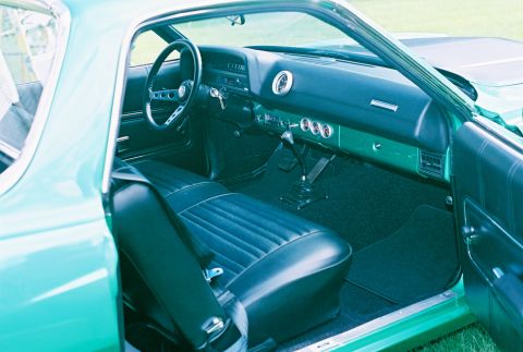 1971 Ford Ranchero - Interior view of a classic car, showing the dashboard, seats, and floor shifter.