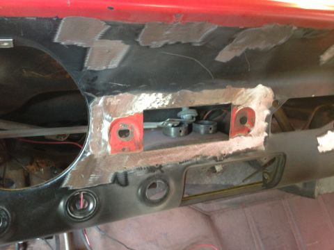 1964 Ford Fairlane - Dashboard area of a car being worked on, showing metalwork and exposed wiring.