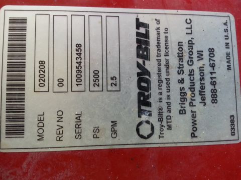 1995 Ford Bronco - Data plate for a Troy-Bilt pressure washer shows model 020208 and serial 1009543458.