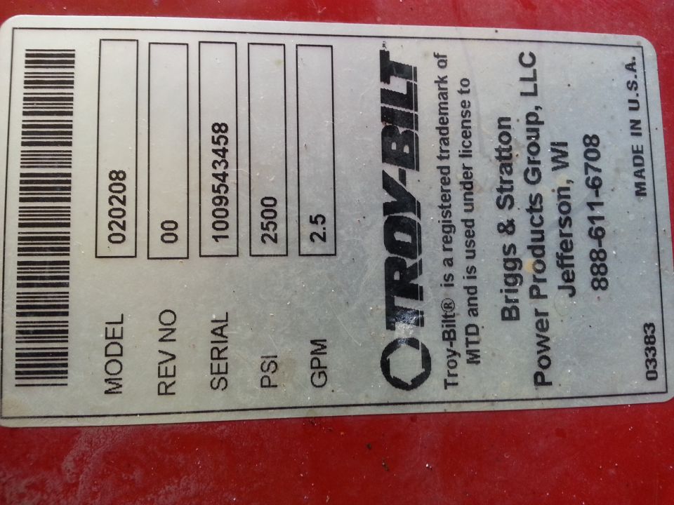 Troy-Bilt pressure washer data plate with model, serial, PSI, and GPM information