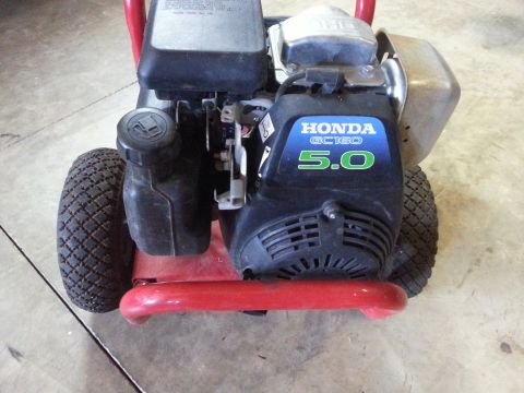 1995 Ford Bronco - Honda GC160 pressure washer engine detail with 5.0 HP rating visible.