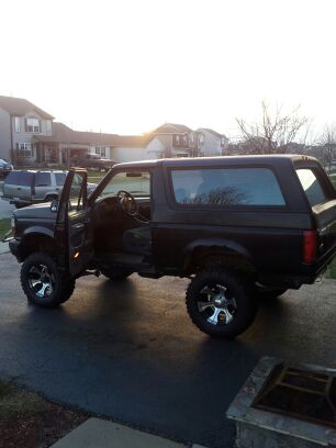 1994 Ford Bronco - This 1994 Ford Bronco is shown with its doors open, revealing the interior.