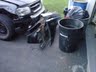 1994 Ford Bronco - Front view of a 1994 Ford Bronco parked next to several trash cans.