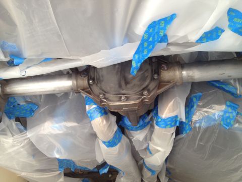 2013 Ford Mustang - Rear differential and axle assembly covered for protection during a project.