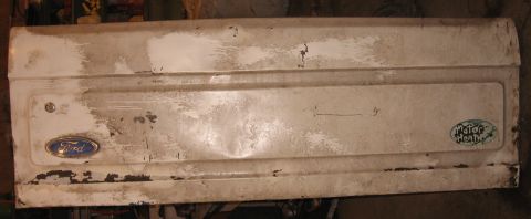 1980 Ford Bronco - Complete tailgate front: not dent and ding. Sticky-dirty, but can be cleaned off with solvent.