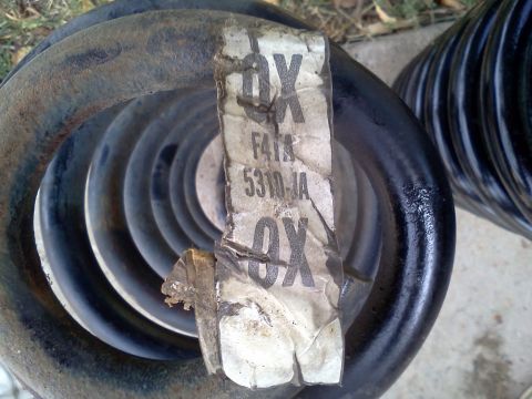 1995 Ford Bronco - Coil springs with a label showing part numbers F41A 5310-JA.
