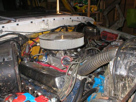 1978 Ford Bronco - Close-up of a V8 engine bay, an aftermarket air cleaner and visible wiring. Supermotors.net logo is present.