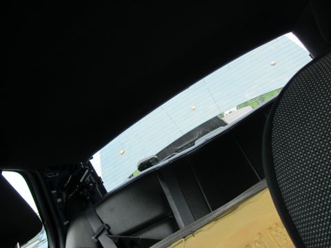 2001 Ford Crown Victoria - Interior view of the rear window and part of the back seat.