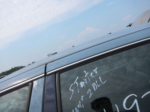 2001 Ford Crown Victoria - Writing on a car window indicates a starter issue and that the car won't idle.