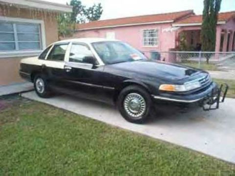 1987 Ford Crown Victoria LTD - 1987 Ford Crown Victoria LTD with a two-tone paint scheme and aftermarket brush guard.