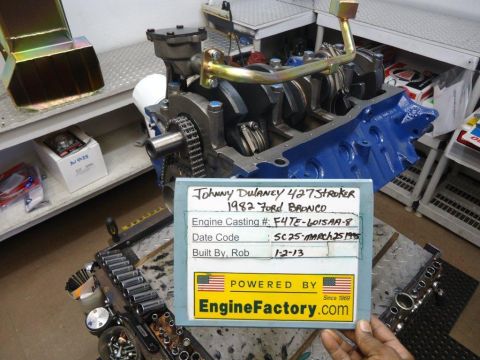 1982 Ford Bronco - Engine block assembly with crankshaft and timing chain, labeled as a 1982 Ford Bronco engine.