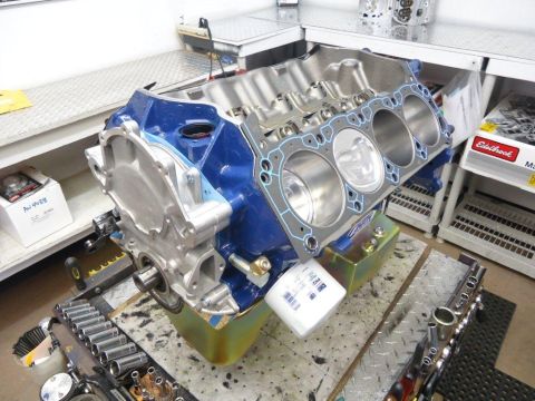 1982 Ford Bronco - Engine block assembly with pistons and gasket, ready for further work.